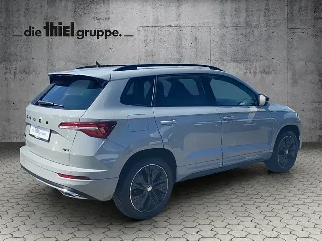 Gebraucht Skoda Karoq SportLine 190 PS (139 kW) 2023 Grau SUV