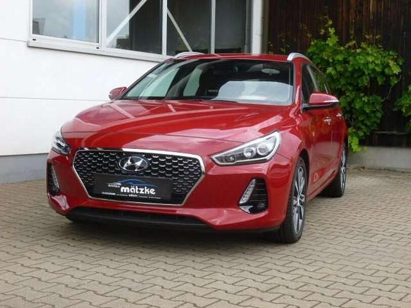 Rot Gebraucht 2018 Hyundai i30 Premium Kombi | 14.990 € (Teuer) - Bild 1/4