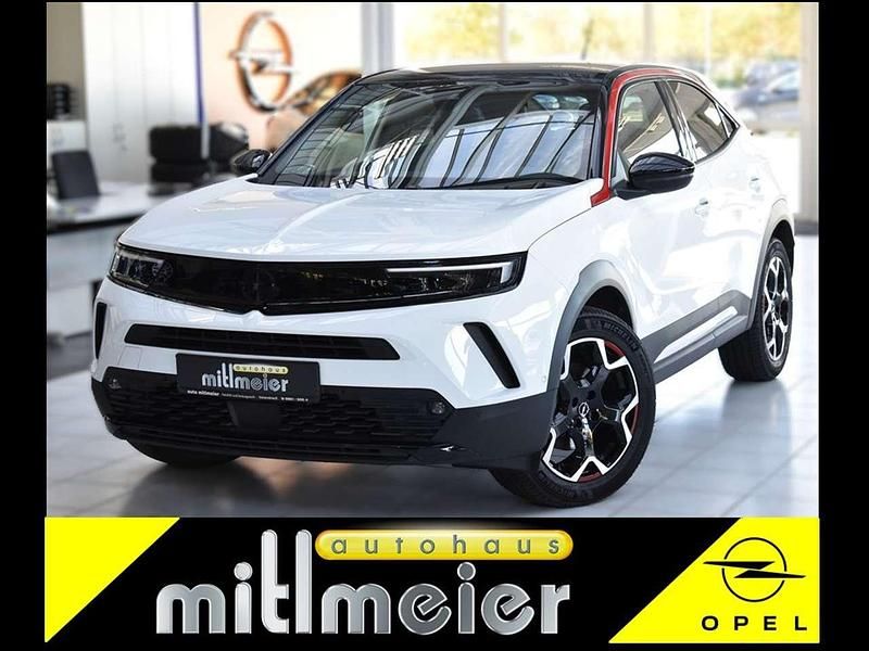 Weiß arktis weiß Gebraucht 2024 Opel Mokka-e SUV | 21.800 € (Fairer Preis) - Bild 1/4