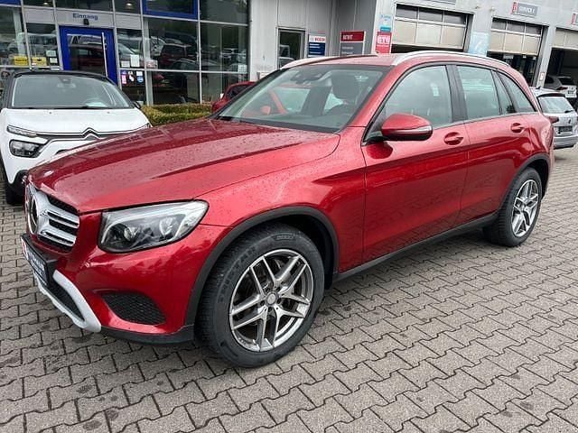 Rot (metallic) Gebraucht 2016 Mercedes GLC250 SUV | 22.998 € (Superpreis) - Bild 1/4