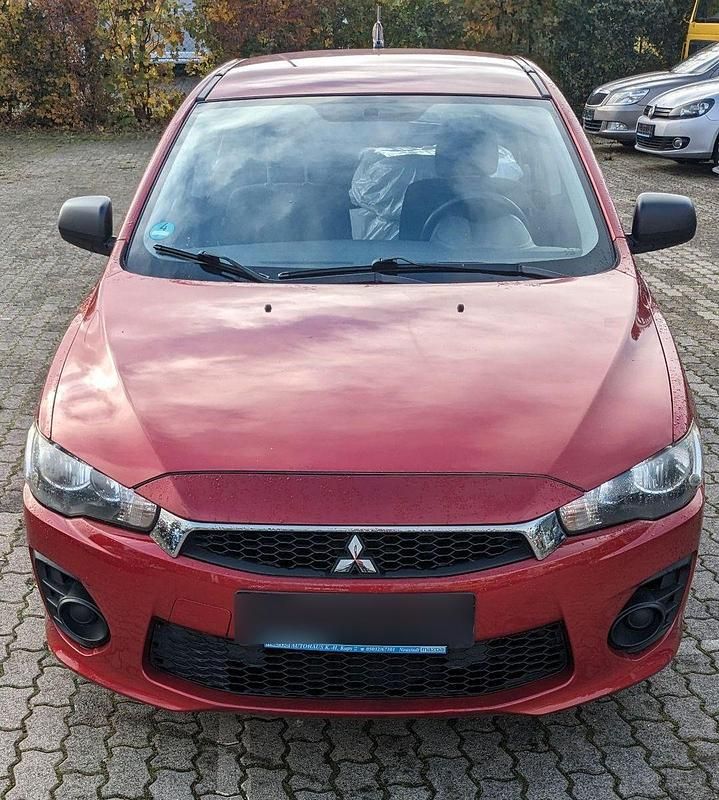 Gebraucht Mitsubishi Lancer 109 PS (80 kW) 2010 Rot Limousine