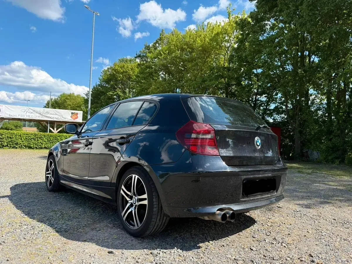 Używany BMW 116 Advantage 122 KM (89 kW) 2010 Czarny Hatchback
