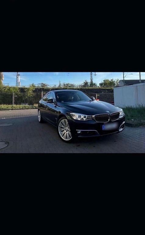 Schwarz Gebraucht 2014 BMW 320 Gran Turismo Luxury Line Limousine | 15.990 € (Fairer Preis) - Bild 1/4