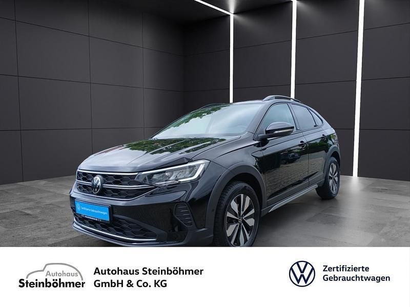 Deep black perleffekt (schwarz) Gebraucht 2024 VW Taigo Move SUV | 24.885 € (Fairer Preis) - Bild 1/4