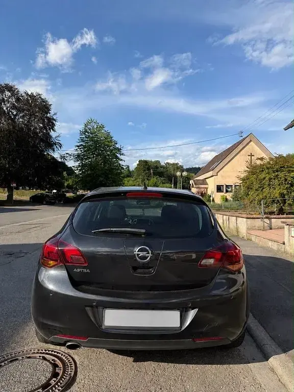 Gebraucht Opel Astra Color Edition 165 PS (121 kW) 2012 Schwarz Limousine