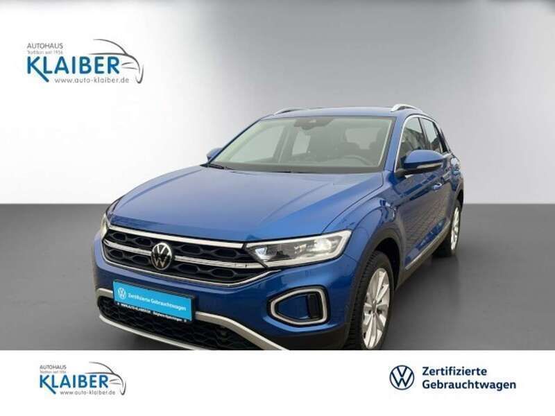 Ravennablau Gebraucht 2023 VW T-Roc Style SUV | 33.490 € (Etwas zu teuer) - Bild 1/4
