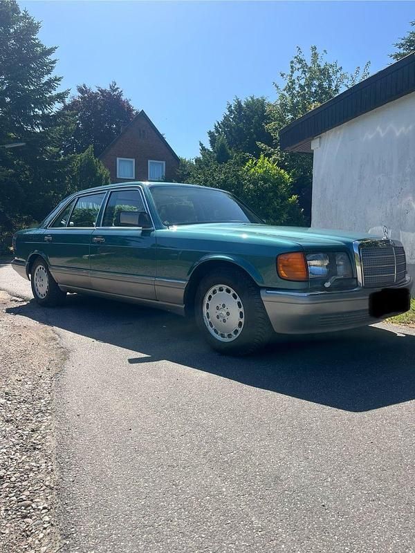 Grün Gebraucht 1986 Mercedes 560 Limousine | 14.900 € - Bild 1/4