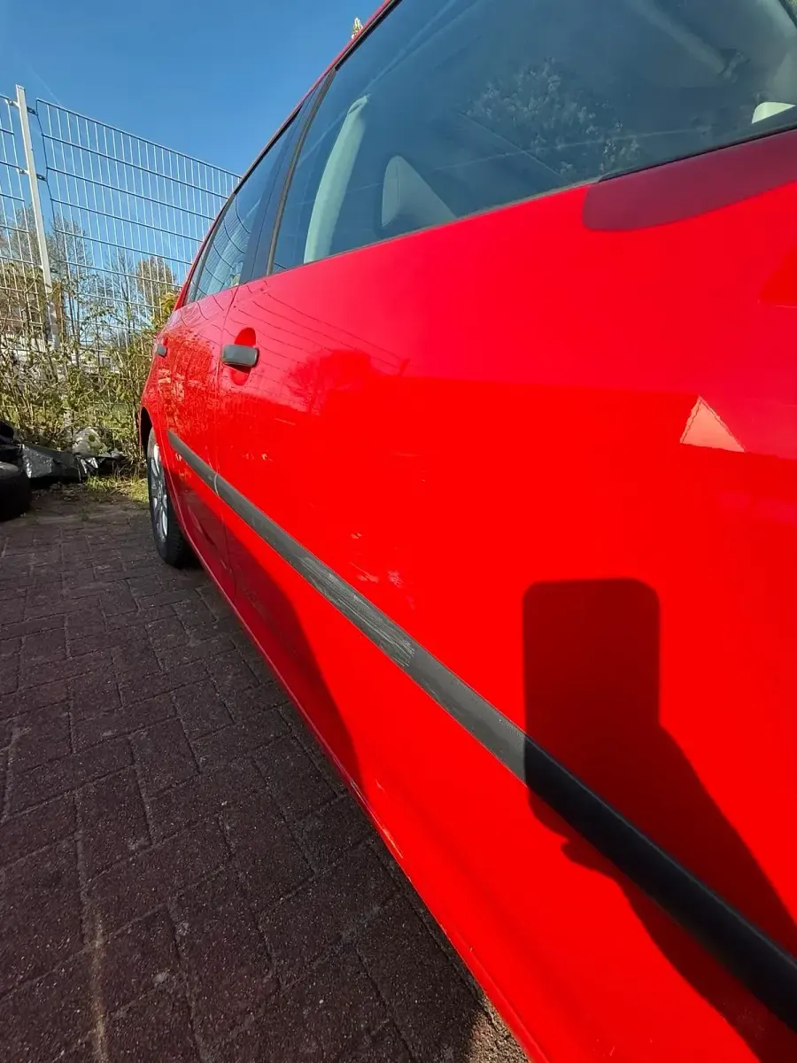 Używany VW Golf IV 2004 Czerwony Sedan/Limuzyna