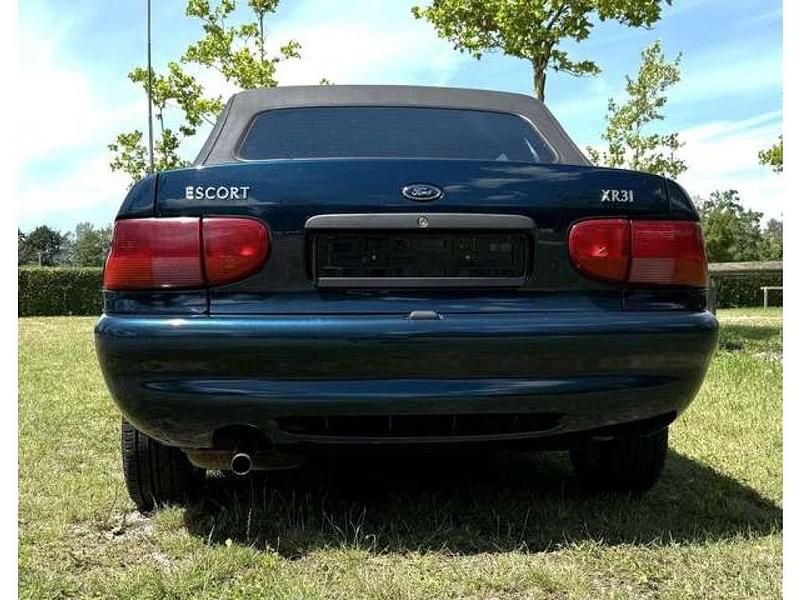 Gebraucht Ford Escort Cabriolet 105 PS (77 kW) 1995 Petrol blue met. Cabrio