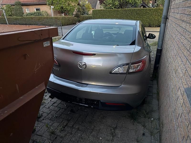 Używany Mazda 3 110 KM (80 kW) 2012 Szary Sedan/Limuzyna