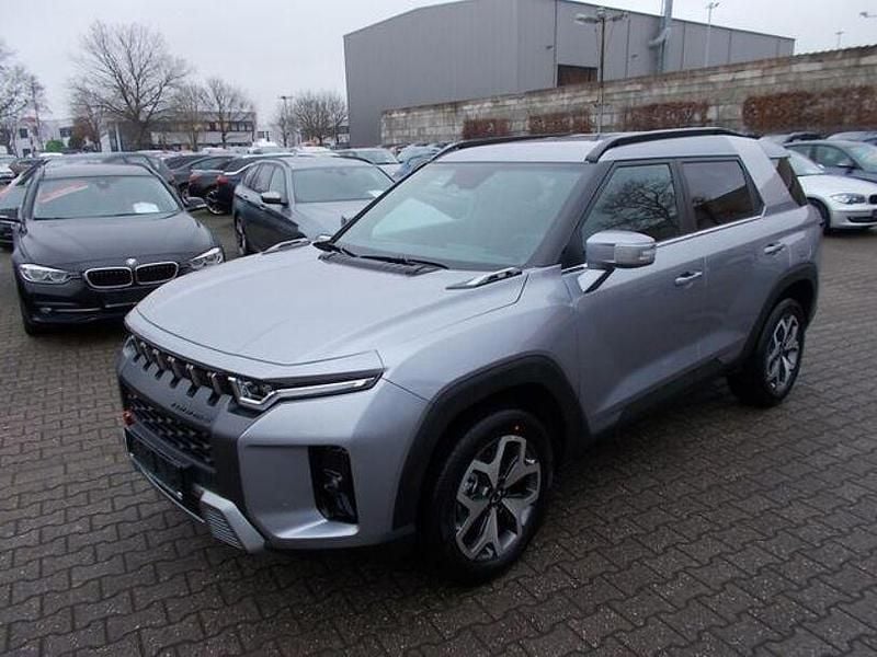 Silber Neu 2025 Ssangyong (KGM) Torres Quartz SUV | 28.490 € - Bild 1/4