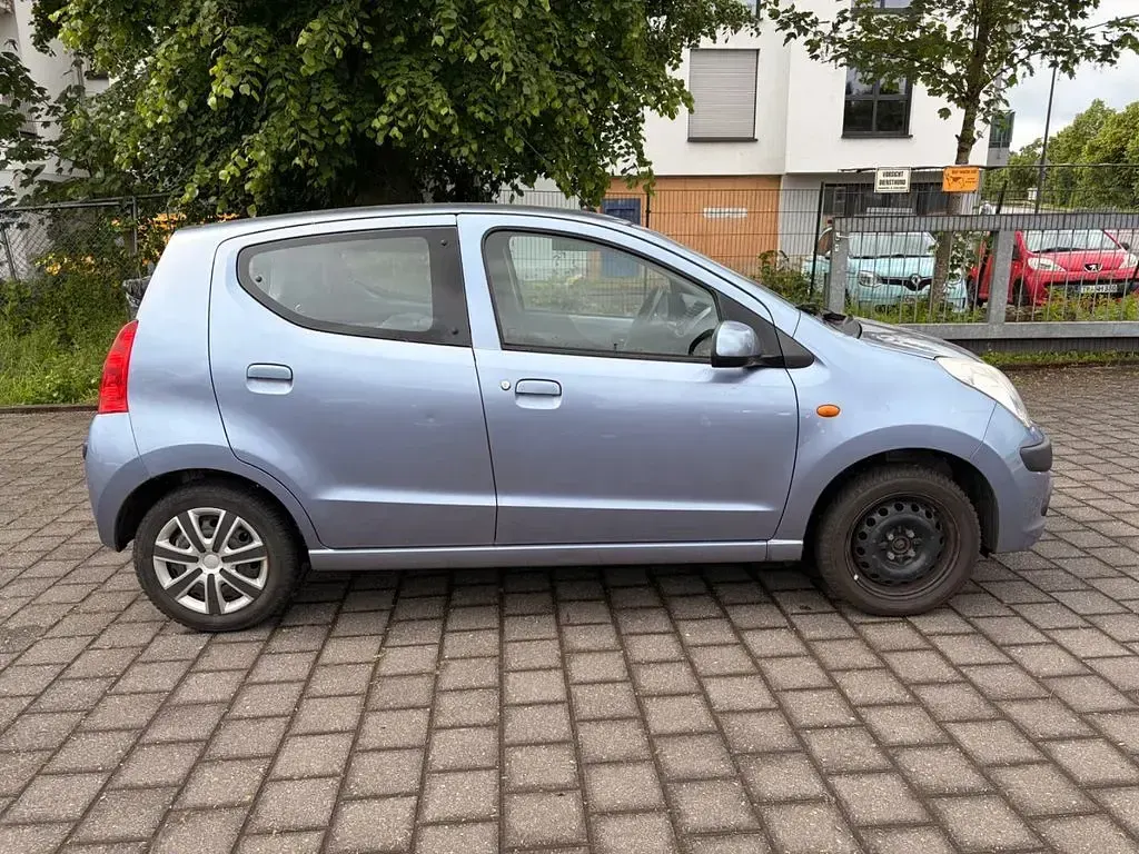 Gebraucht Nissan Pixo Acenta 68 PS (50 kW) 2009 Blau Kleinwagen