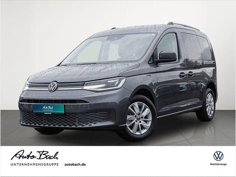 Grau (indiumgrau metallic) Gebraucht 2024 VW Caddy Life Van / Kleinbus | 34.980 € (Fairer Preis) - Bild 1/4