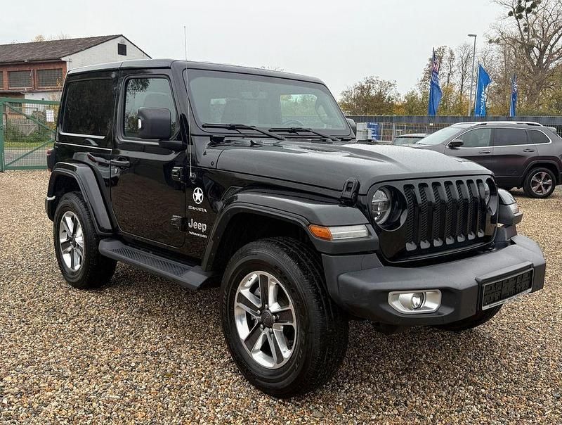 Schwarz Gebraucht 2018 Jeep Wrangler Unlimited Sahara SUV | 34.990 € (Superpreis) - Bild 1/4