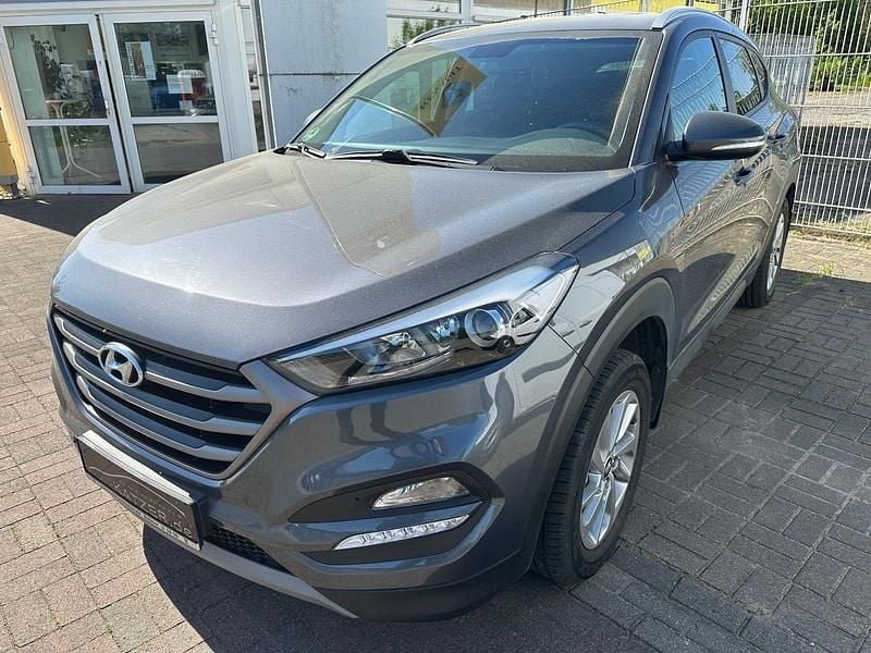 Grau Gebraucht 2017 Hyundai Tucson Trend SUV | 14.990 € (Fairer Preis) - Bild 1/4
