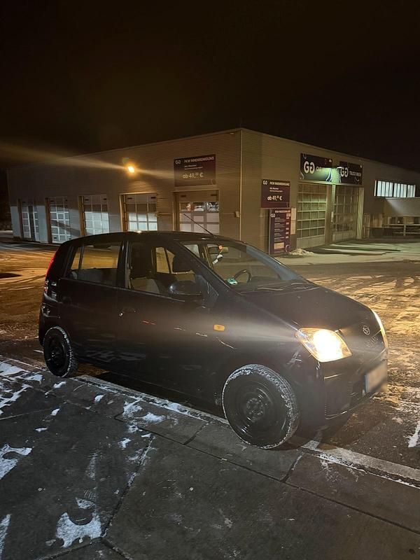 Gebraucht Daihatsu Cuore Plus 58 PS (42 kW) 2005 Schwarz Kleinwagen