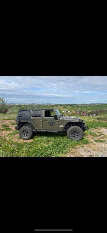Grün Gebraucht 2016 Jeep Wrangler Sahara SUV | 33.000 € (Fairer Preis) - Bild 1/4