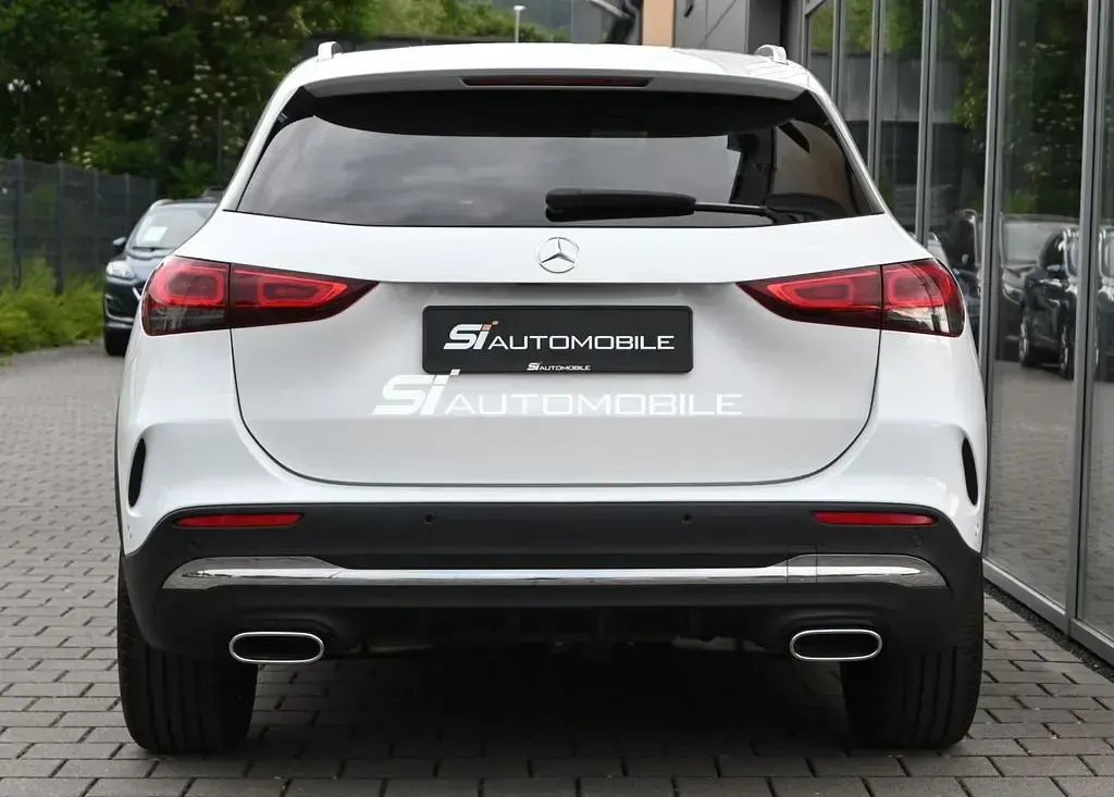 Gebraucht Mercedes GLA250 AMG line 224 PS (164 kW) 2023 Digitalweiss  metalliclack SUV