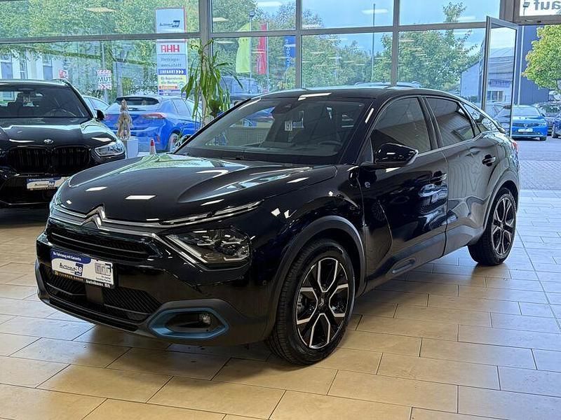 Schwarz Gebraucht 2023 Citroën e-C4 Shine Limousine | 20.470 € (Fairer Preis) - Bild 1/4