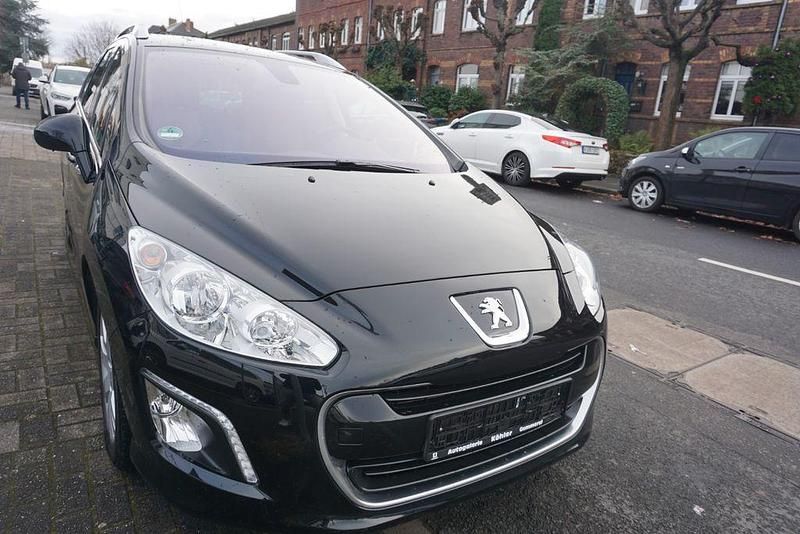 Gebraucht Peugeot 308 SW Family 111 PS (81 kW) 2012 Schwarz Kombi