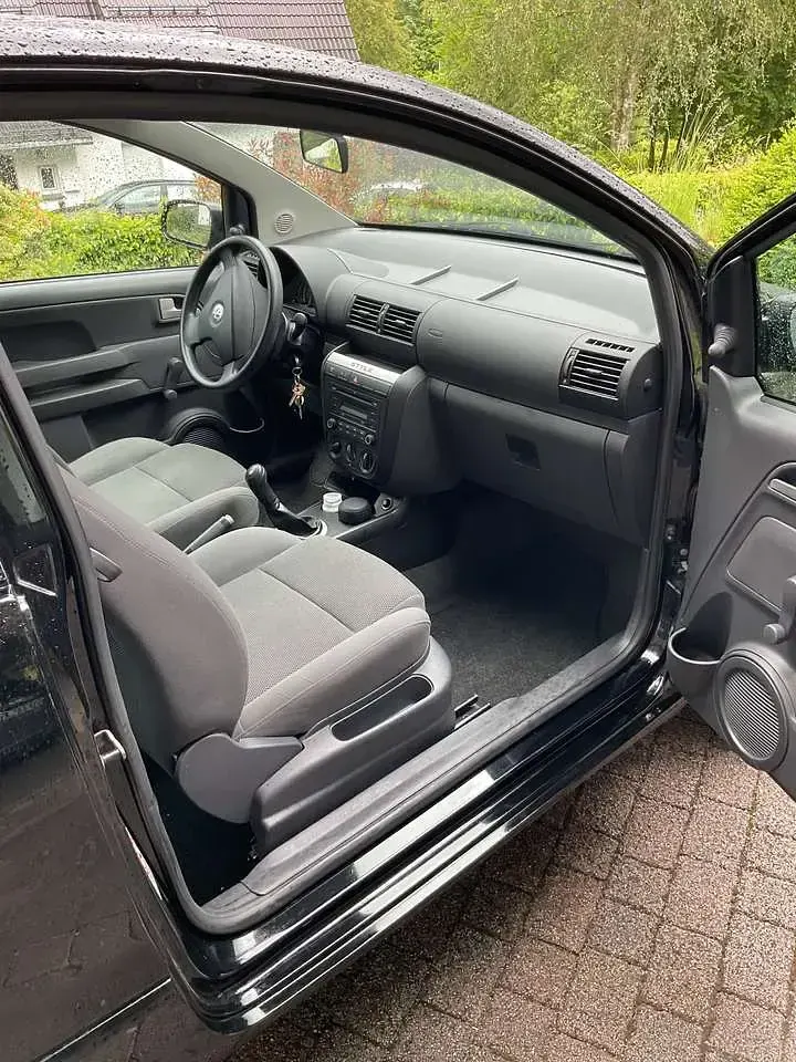 Gebraucht VW Fox Style 60 PS (44 kW) 2011 Schwarz Kleinwagen