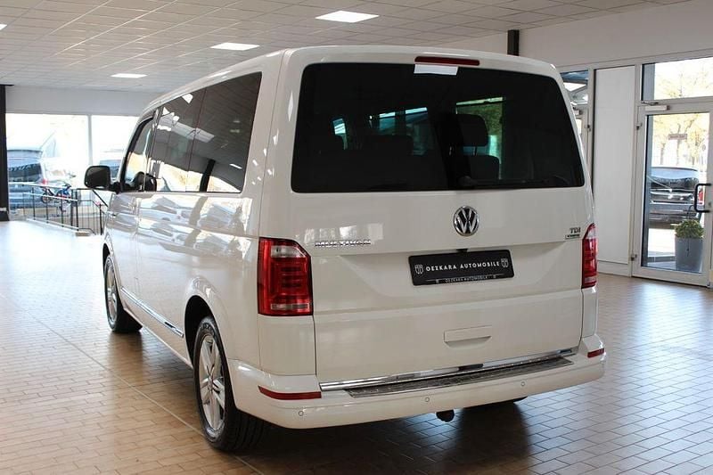 Second-hand VW Multivan Generation Six 150 CP (110 kW) 2015 Alb Monovolum