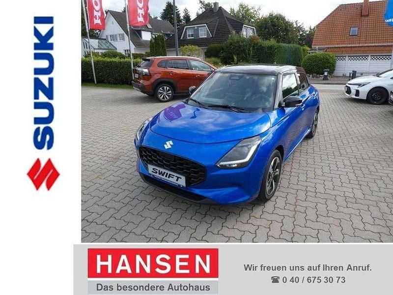 Black/frontier blue pearl Gebraucht 2024 Suzuki Swift Comfort+ Kleinwagen | 17.950 € (Fairer Preis) - Bild 1/4