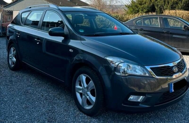 Grau Gebraucht 2011 Kia Ceed Sportswagon 4 Kombi | 5.699 € (Fairer Preis) - Bild 1/4