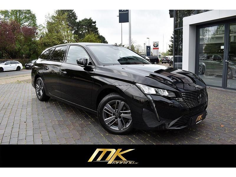Perla nera schwarz (metallic) Gebraucht 2024 Peugeot 308 SW Allure Kombi | 18.989 € - Bild 1/4