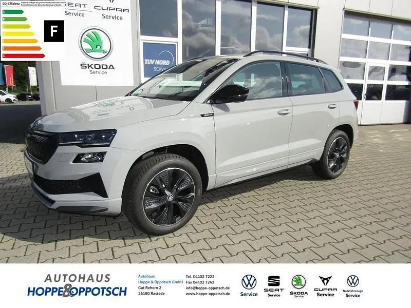 Grau Gebraucht 2024 Skoda Karoq SportLine SUV | 41.990 € (Teuer) - Bild 1/4