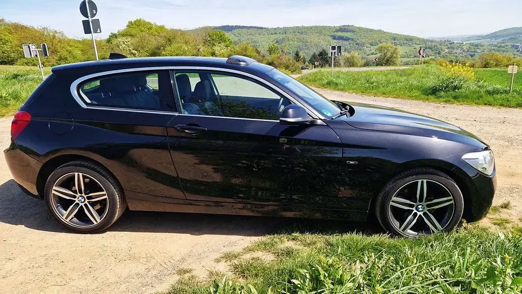 Gebraucht BMW 116 Sport Line 136 PS (100 kW) 2014 Schwarz Kleinwagen