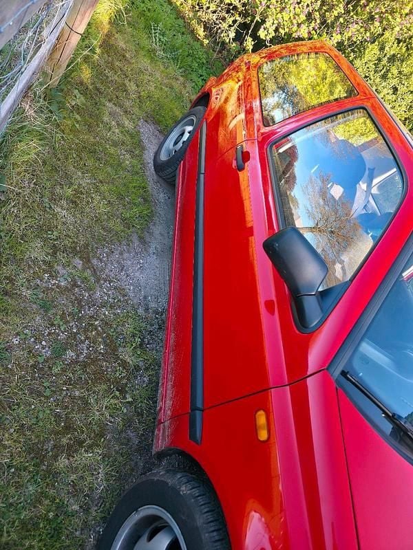 Używany VW Golf 60 KM (44 kW) 1996 Czerwony Coupe