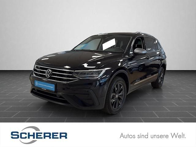 Deep black perleffekt (metallic) Gebraucht 2024 VW Tiguan Allspace Move SUV | 34.400 € (Guter Preis) - Bild 1/3