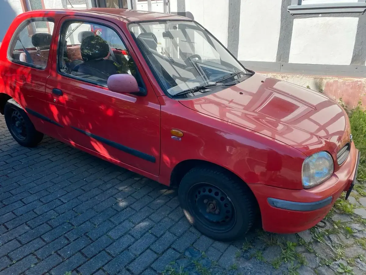 Używany Nissan Micra 54 KM (39 kW) 1999 Czerwony Hatchback
