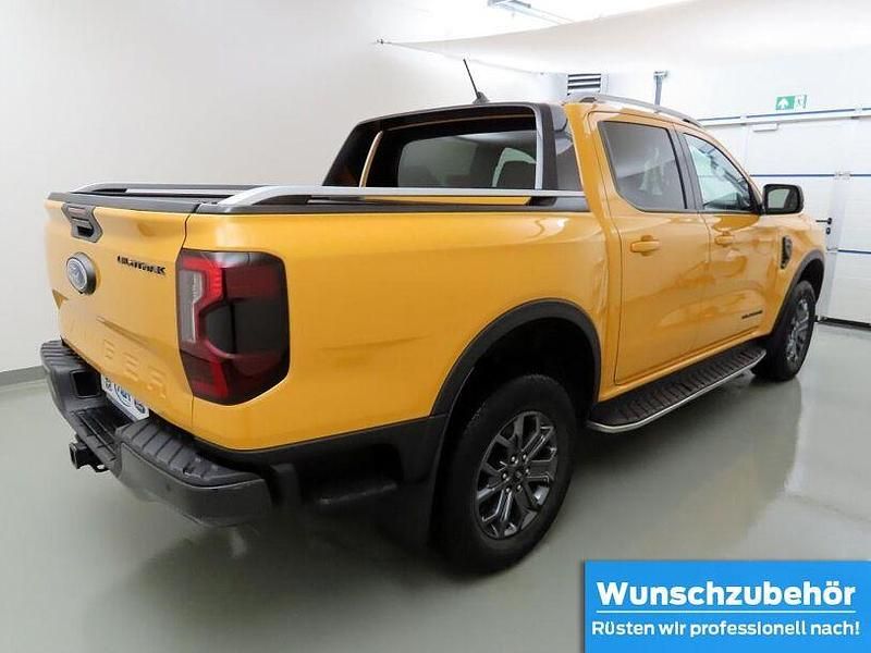 Gebraucht Ford Ranger Wildtrack 241 PS (177 kW) 2024 Cyberorange (metallic) Abholung