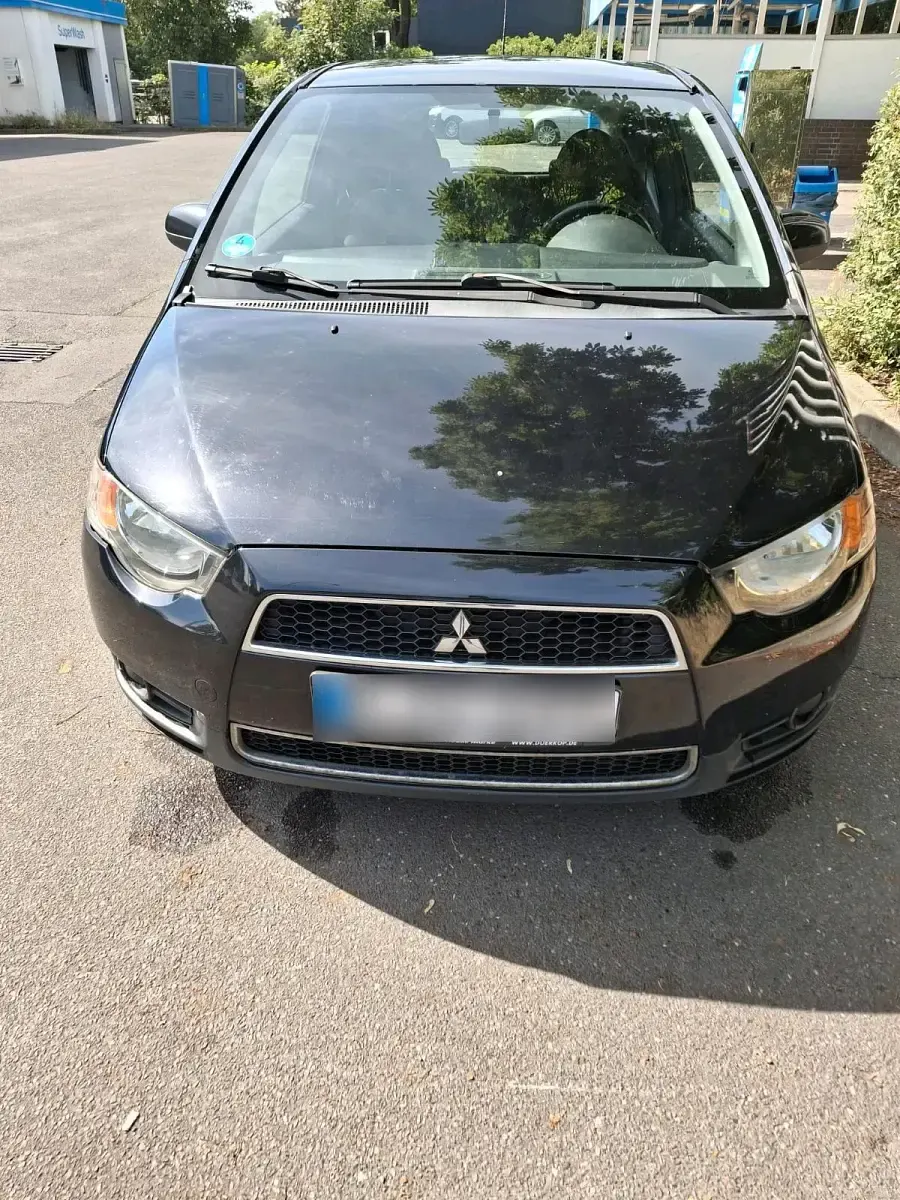 Gebraucht Mitsubishi Colt 95 PS (69 kW) 2011 Schwarz Kleinwagen