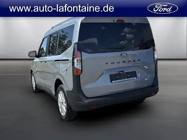 Gebraucht Ford Tourneo Courier Titanium 125 PS (91 kW) 2025 Solarsilber Van / Kleinbus