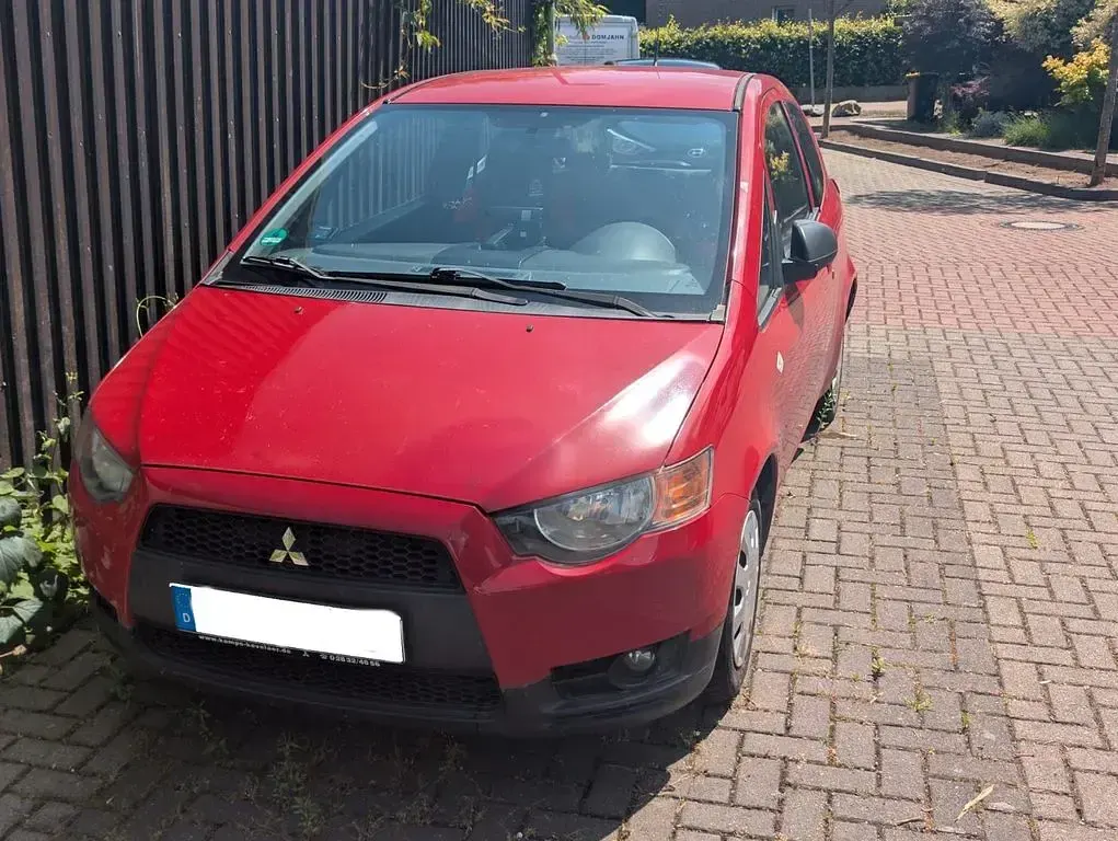 Gebraucht Mitsubishi Colt 75 PS (55 kW) 2009 Rot Kleinwagen