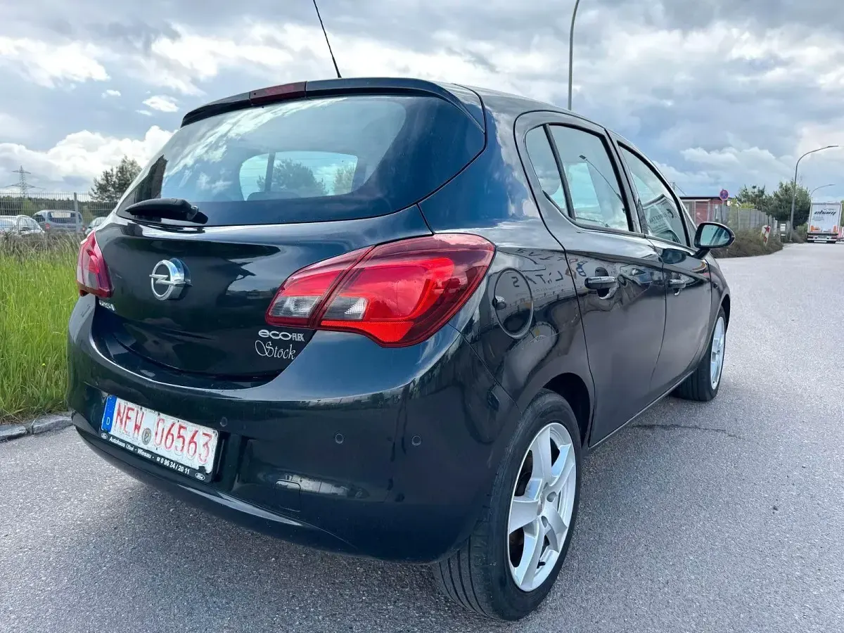 Używany Opel Corsa 90 KM (66 kW) 2015 Czarny Hatchback