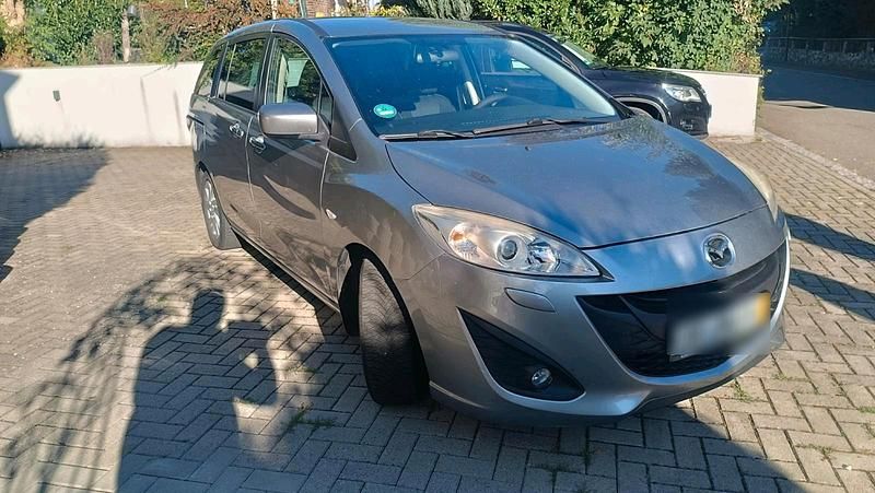 Grau Gebraucht 2011 Mazda 5 Inclusive Van / Kleinbus | 3.990 € (Guter Preis) - Bild 1/4