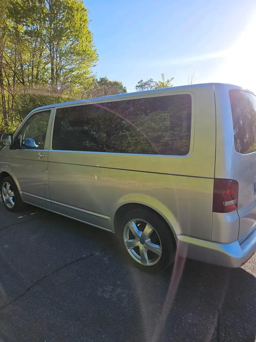 Używany VW Multivan Edition 180 KM (132 kW) 2013 Srebrny Minivan