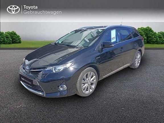 Mysticschwarz Gebraucht 2014 Toyota Auris Hybrid Executive Kombi | 12.930 € (Fairer Preis) - Bild 1/4