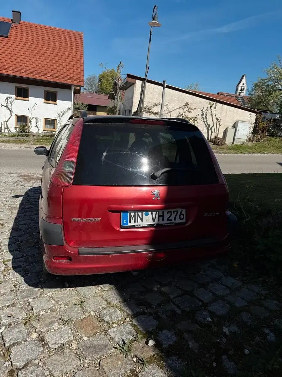 Używany Peugeot 206 108 KM (79 kW) 2012 Czerwony Kombi