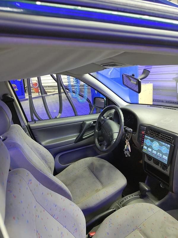 Gebraucht VW Polo 60 PS (44 kW) 1997 Grün Kombi