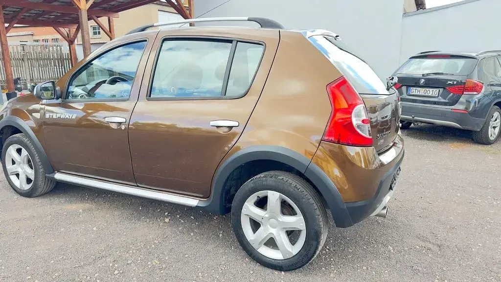 Gebraucht Dacia Sandero Stepway 84 PS (61 kW) 2012 Braun Limousine