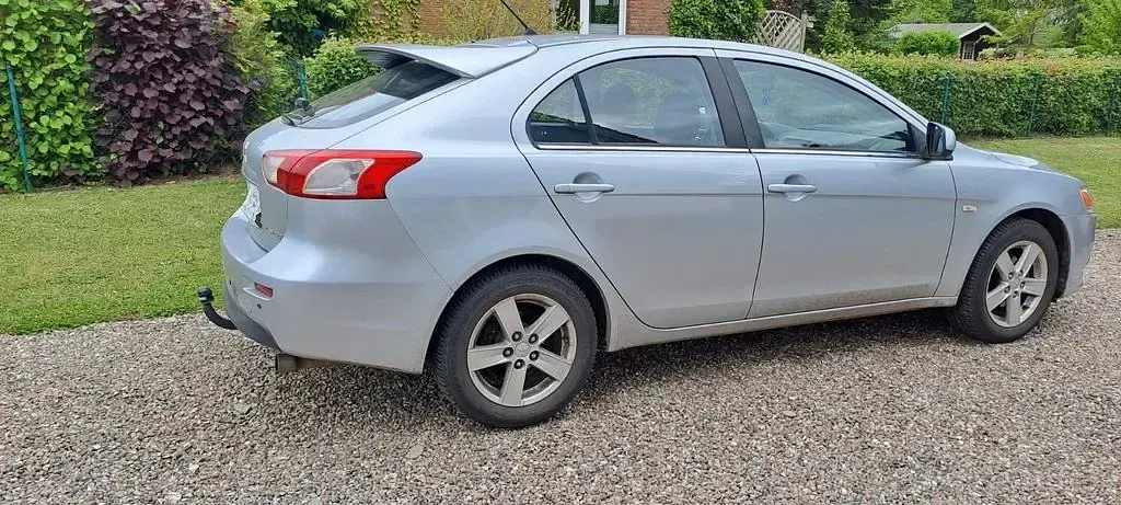 Gebraucht Mitsubishi Lancer Inform 143 PS (105 kW) 2009 Silber Limousine