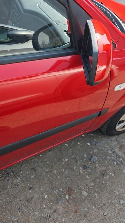 Gebraucht Kia Rio Basis 97 PS (71 kW) 2009 Rot Limousine