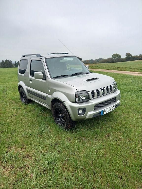 Grau Gebraucht 2016 Suzuki Jimny Comfort SUV | 15.350 € (Guter Preis) - Bild 1/4