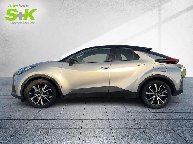 Gebraucht Toyota C-HR Team 197 PS (144 kW) 2024 Shimmering silver metallic / dach schwarz (schwarz) SUV
