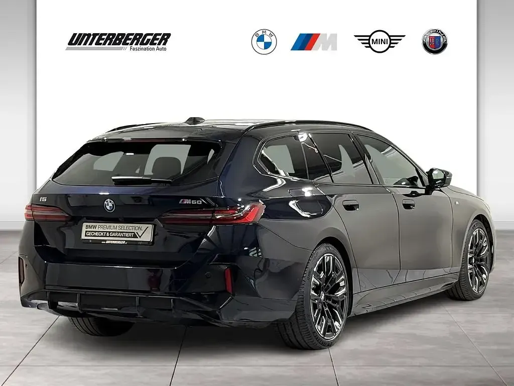 Gebraucht BMW i5 Performance 442 kW (601 PS) 2025 M carbonschwarz Kombi
